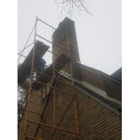 Tuck pointing a chimney